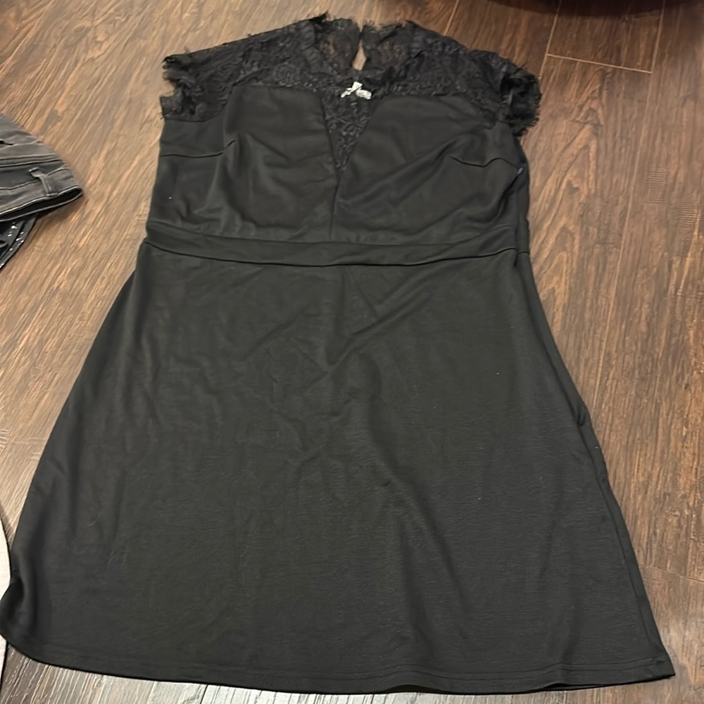 Maurice's black dress